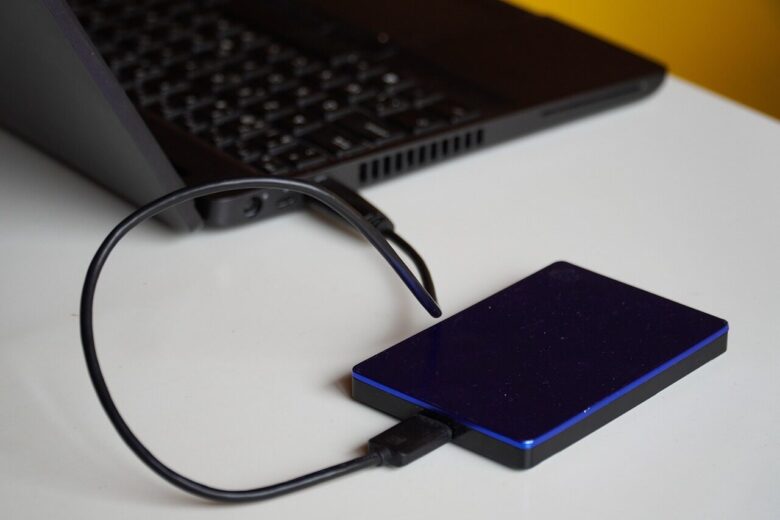 external hard drive, portable storage, portable hard drive, laptop, memory disk, memory, storage, digital, power, power bank, huge, minimalistic